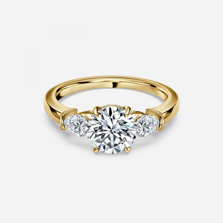 Trilogy Round Cut Engagement Ring