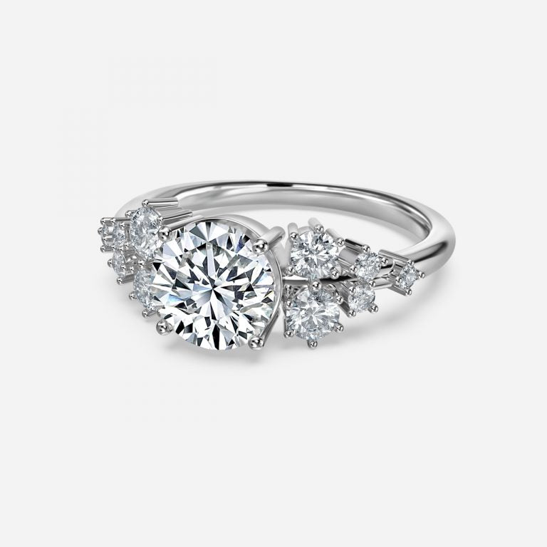 Round Cut Side Stone Engagement Ring