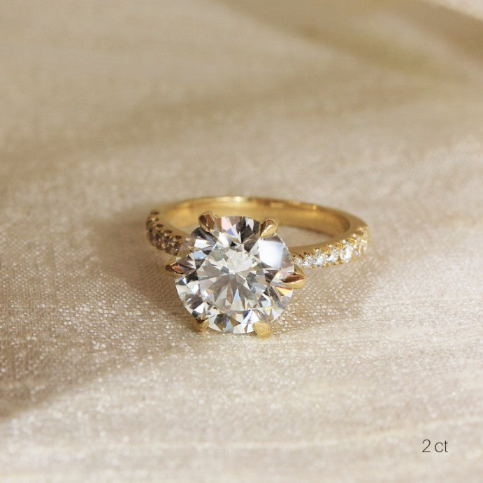 Round Cut Cluster Side Stone Engagement Ring