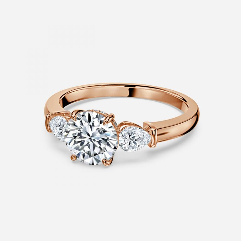 Trilogy Round Cut Engagement Ring