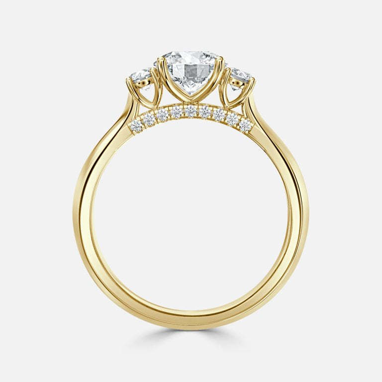 Round Cut Trilogy Engagement Ring