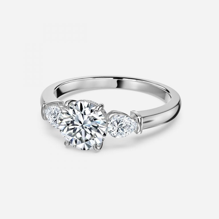 Trilogy Round Cut Engagement Ring